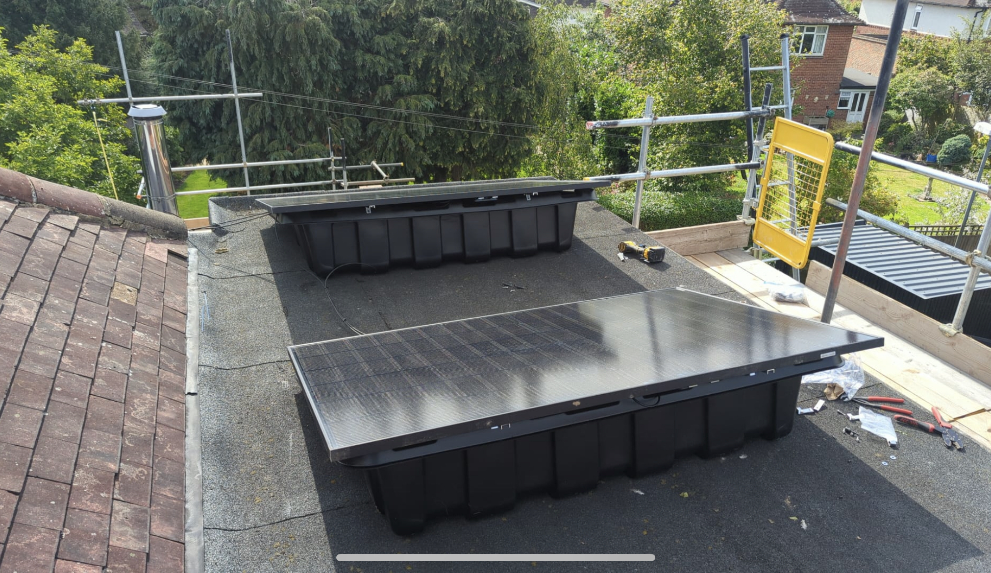 Flat roof solar panels in a Renusol Console+ tub