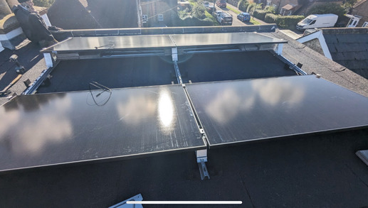 Flat roof solar panel system using VanDerValk mounting